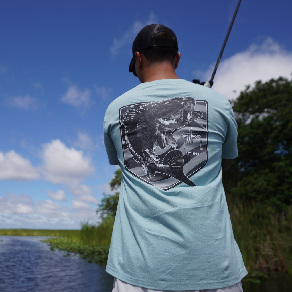 Guy Harvey HarborLite Tee - Bass Badge — BLUE SURF (official product shot)